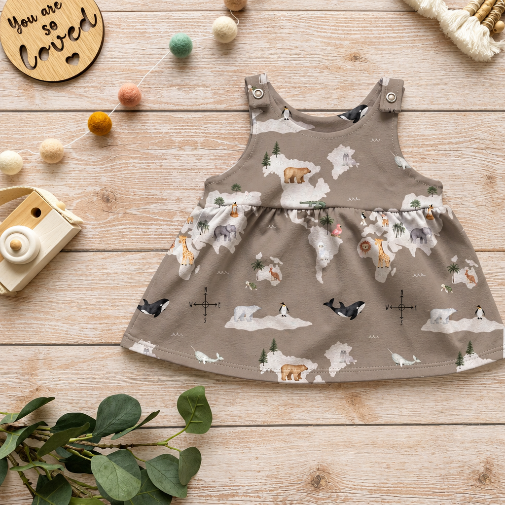 World Animals Latzkleid Flatlay